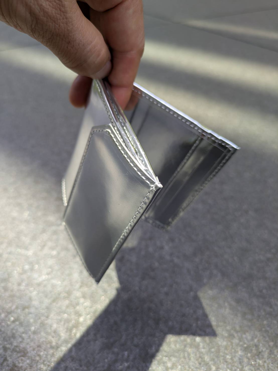 Taglich たぐりっひ タグリッヒ タグリッヒ- 革小物オンラインストア マジックポケット二つ折り財布 ステン シルバー